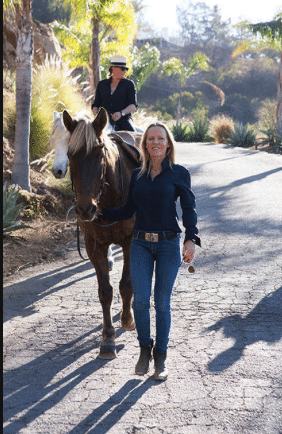 Alice Bamford and Ann riding a horse