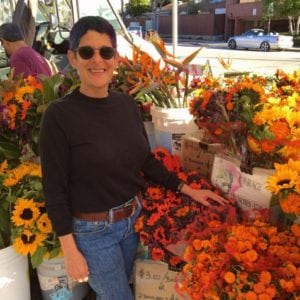 Carolyn Kates buying flowers