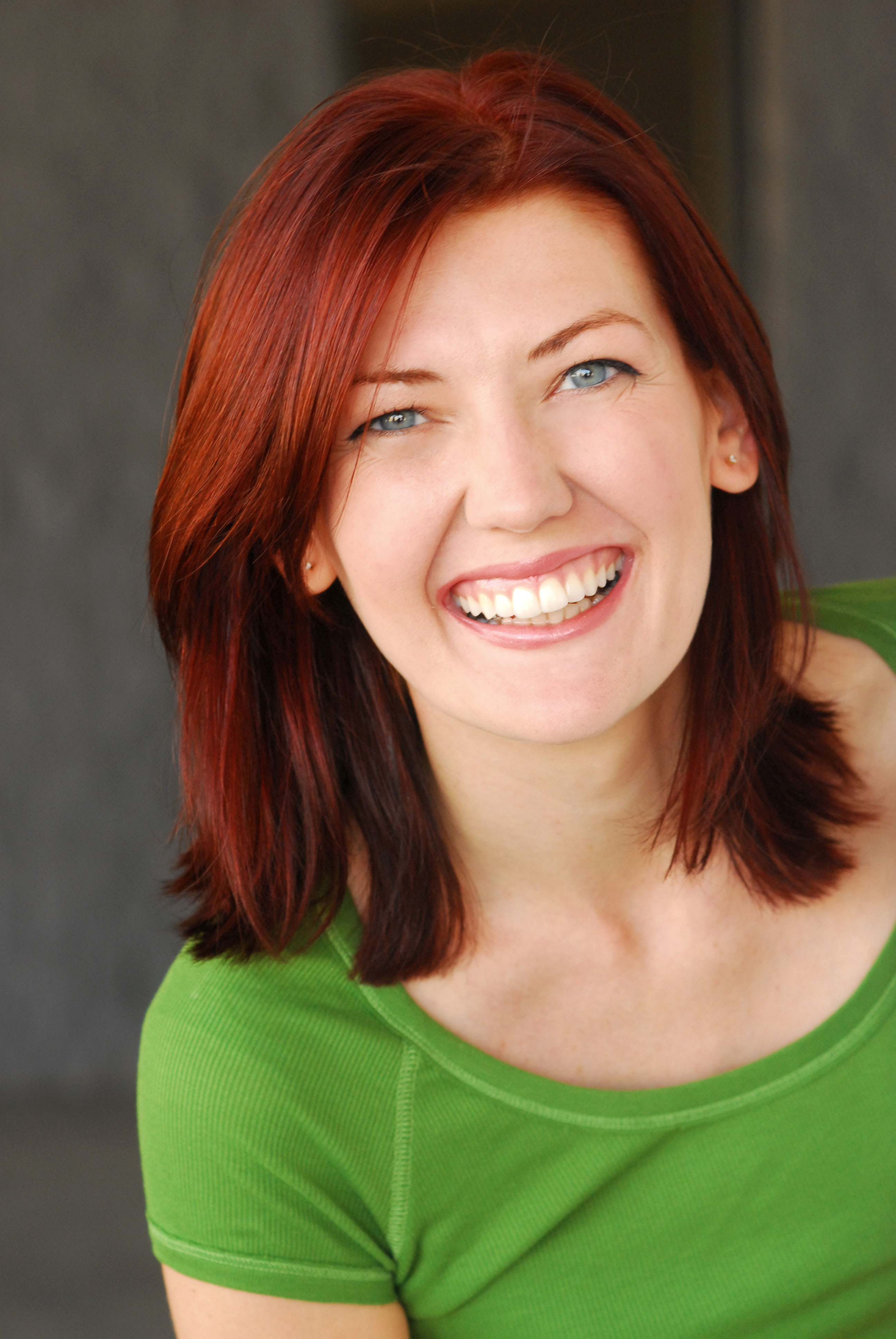 Shannon O’Donnell Smiling in a green shirt